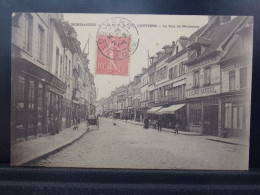 27243 . LOUVIERS . LA RUE DU NEUBOURG . OBLITEREE 1905 . COMMERCES . QUINCAILLERIE - Louviers