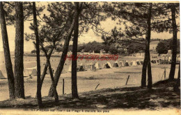 CPA SAINT PALAIS SUR MER - 17 - LA PLAGE  TRAVERS LES PINS - Autres & Non Classés