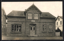 Foto-AK Neumünster, Geschäftshaus Claus Ralfs 1913  - Neumuenster