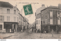 J3- 77) LIZY SUR OURCQ -  LA GRANDE RUE - (ANIMEE - CHARCUTERIE - PHARMACIE) - Lizy Sur Ourcq