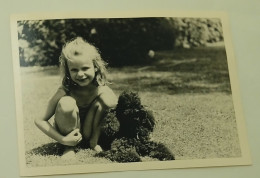 A Little Girl And A Poodle - Anonymous Persons