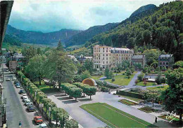 63 - Le Mont Dore - Le Parc Et L'Hotel Des Sapins - Au Fond La Chaine Du Sancy Et Le Capucin - CPM - Voir Scans Recto-Ve - Le Mont Dore