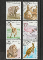 Laos Lot De 21 Timbres Les Animaux - éléphant, Lion, Kangourou, Flamand Rose, Koala, Girafe, Faisans, Serpents - Laos