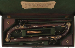 A CASED PAIR OF 16-BORE SILVER MOUNTED PRESENTATION - Decorative Weapons