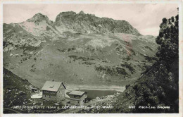 73981061 Freiburgerhuette_1934m_Vorarlberg_AT Mit Formarinsee Und Rote Wand - Autres & Non Classés