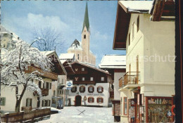 72254649 Kirchberg Tirol Ortspartie An Der Kirche Gasthof Im Winter Kirchberg In - Sonstige & Ohne Zuordnung