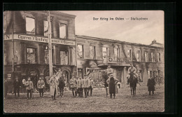 AK Stallupönen, Strassenpartie Mit Ehem. Cigarren Geschäft, Krieg Im Osten  - Ostpreussen