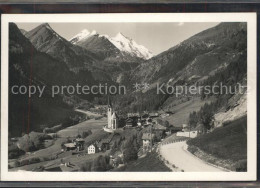 71541598 Heiligenblut Kaernten Ortsblick Mit Grossglockner Hochalpenstrasse Roja - Altri & Non Classificati