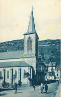 63.  LE MONT DORE .  L'Eglise . CPA Animée . - Le Mont Dore