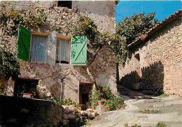 04 - Gréoux Les Bains - Vieille Rue Pittoresque Du Village - Fleurs - CPM - Voir Scans Recto-Verso - Gréoux-les-Bains