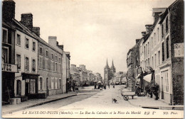 50 LA HAYE DU PUITS - La Rue Du Calvaire Et Place Du Marche  - Autres & Non Classés