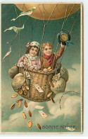 N°19627 - Carte Gaufrée - Bonne Année - Enfants Dans Une Nacelle De Montgolfière, D'où Tombe Des Pièces D'or - New Year