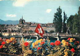 Suisse - GE Genève - Genève - La Ville Et La Cathédrale De Saint-Pierre Depuis Le Quai Du Mont-Bianc - Fleurs - CPM - Ca - Autres & Non Classés