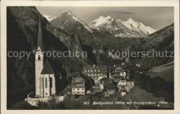 71541416 Heiligenblut Kaernten Kirche Und Grossglockner Rojach - Autres & Non Classés