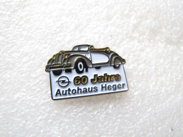Delcampe - PIN'S  OPEL  60 JAHRE   AUTOHAUS  HEGER - Opel