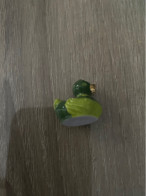 Delcampe - Fève Canard Avec Bec Doré - Tiere