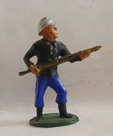FIGURINE STARLUX 1953 POMPIER AVEC UNE LANCE D'INCENDIE 221 SR MC - Starlux