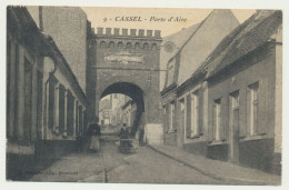 Delcampe - CASSEL - Porte D'aire - Animée - Homme Poussant Une Brouette - Cassel