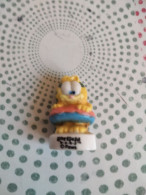 Feve Garfield Baby Avec La Bouée - Santons