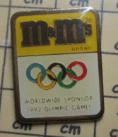 521 Pin's Pins / Beau Et Rare / JEUX OLYMPIQUES / CONFISERIE M&M's WORLDWIDE SPONSOR 1992 - Informatica