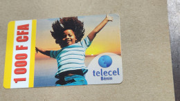 BENIN-(BJ-TEL-REF-0001C)-Happy Girl Jumping-(75)-(1000fcfa)-(9690-2090-0863)-used Card - Benin