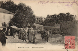 Delcampe - CPA ALGERIA MOSTAGANEM La Rue Du Marche (1146272) - Mostaganem