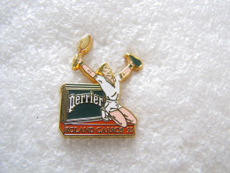 PIN'S    PERRIER   ROLAND GARROS  93  ARTHUS BERTRAND - Arthus Bertrand