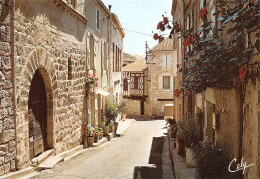 MONTCUQ Vieille Rue Fleurie, En Fond Maison à Colombage 25 (scan Recto Verso)MH2932 - Montcuq