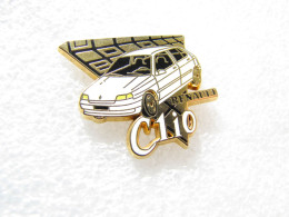 PIN'S  RENAULT   CLIO  ARTHUS BERTRAND - Renault