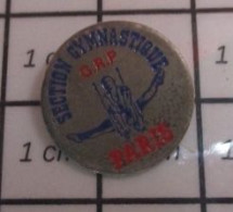 816c Pin's Pins / Beau Et Rare / SPORTS / CLUB DE GYMNASTIQUE MASCULINE SECTION GRP PARIS ANNEAUX - Ginnastica