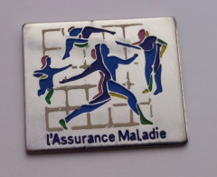 S62 Pin's ASSURANCE MUTUELLE SÉCURITÉ SOCIALE Logo Coloré Achat Immédiat - Administración