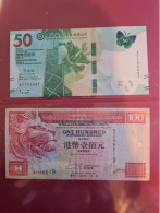 Billets Hong Kong/ Lot De 2 Billets. Un De 50 Dollars En Tbe, Et Un De 100 Dollars  En Etat Moyen - Hong Kong
