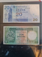 Billets Hong Kong/ Lot De 2 Billets. Un De 20 Dollars En Etat Moyen, Et Un De 10 Dollars  En Etat Moyen - Hong Kong