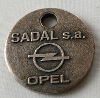 Jeton De Caddie - Automobiles - OPEL - SADAL S.A. - SEBAZAC/RODEZ - FIGEAC - En Métal - - Trolley Token/Shopping Trolley Chip
