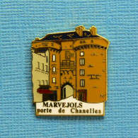 1 PIN'S // ** MARVEJOLS (48) PORTE DE CHANELLES ** . (GL & JC©) - Andere & Zonder Classificatie