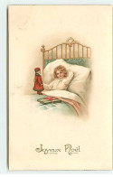 N°21932 - Joyeux Noël - Enfant Dans Un Lit, Jouant Avec Un Petit Père Noël - Andere & Zonder Classificatie