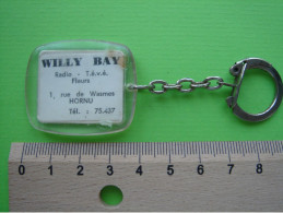 HORNU - 1 Rue De Wasmes - WILLY BAY Radio - T.é.v.é. - Fleurs - Michel PAJE - Porte Clefs - Portachiavi