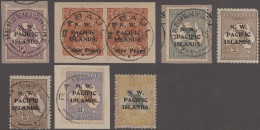Delcampe - New Guinea: 1915/1922, Mainly Used Lot Of Eight Stamps Incl. £1 Brown/blue On Pi - Papua Nuova Guinea