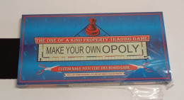JUEGO DE MESA MAKE YOUR OWN OPOLY,THE ONE OF A KIND PROPERTY TRADING GAME,VINTAGE DE 1998,NUEVO,2-6 JUGADORES,+8 AÑOS - Jouets Anciens
