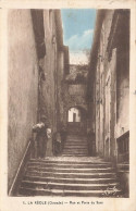 LE REOLE - RUE ET PORTE DU SAUT - La Réole
