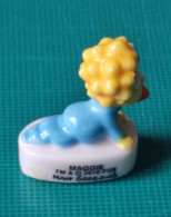 Delcampe - Fève / Fèves 2009 The Simpsons Maggie (T 3541)  AFF 2009 Page 35 - Fève Brillante - Comics