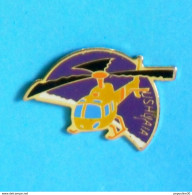 Delcampe - 1 PIN'S //  ** HÉLICOPTÈRE USHUAÏA ** - Luftfahrt