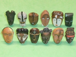 Delcampe - TB123 / Fève / Série De Fèves Complète : Masques Africains " Mat " - Autres & Non Classés