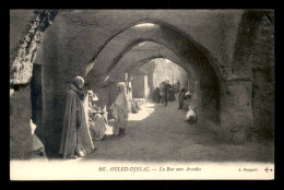 Delcampe - ALGERIE - SAHARA - OULED-DJELAL - LA RUE AUX ARCADES - Sonstige & Ohne Zuordnung