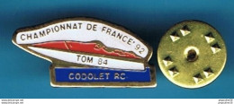 Delcampe - PIN'S  //   ** MODELISME / CHAMPIONNAT DE FRANCE / '92 / CODOLET RC / TOM 84 ** - Boten