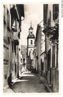 Delcampe - CAR-ADAP10-0506-68 - RIQUEWIHR - Une Rue Et Le Clocher De L'église - Riquewihr