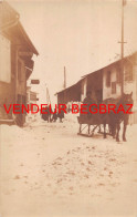 Delcampe - HAUTEVILLE   CARTE PHOTO  RUE ENNEIGEE   COIFFEUR  TRAINEAU - Hauteville-Lompnes