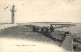 Delcampe - CPA Cannes Le Phare Et La Jetee - Faros