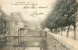Delcampe - Carte Postale Ancienne - 61 - Laigle - Un Coin De La Place Boislandry - Animé - CPA - Voir Scans Recto-Verso - Poscard - - L'Aigle