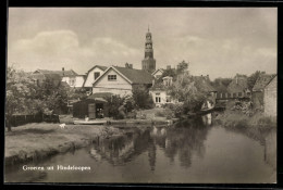 Delcampe - AK Hindeloopen, Gezicht Op Gracht, Huizen En Kerktoren - Hindeloopen